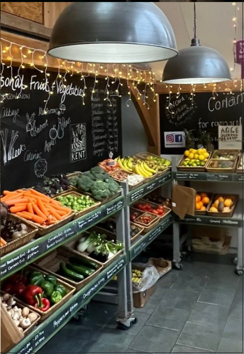The local farm shop with fresh fruit, vegetables and fairy lights