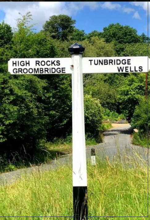 Traditional Kent signpost pointing to High Rocks, Groombridge and Tunbridge Wells