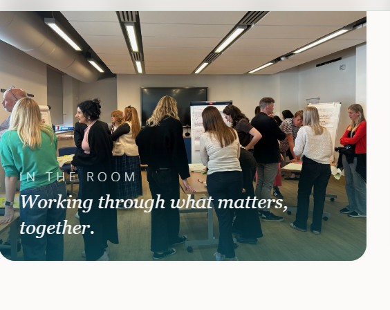 A leadership team working together during a facilitated offsite