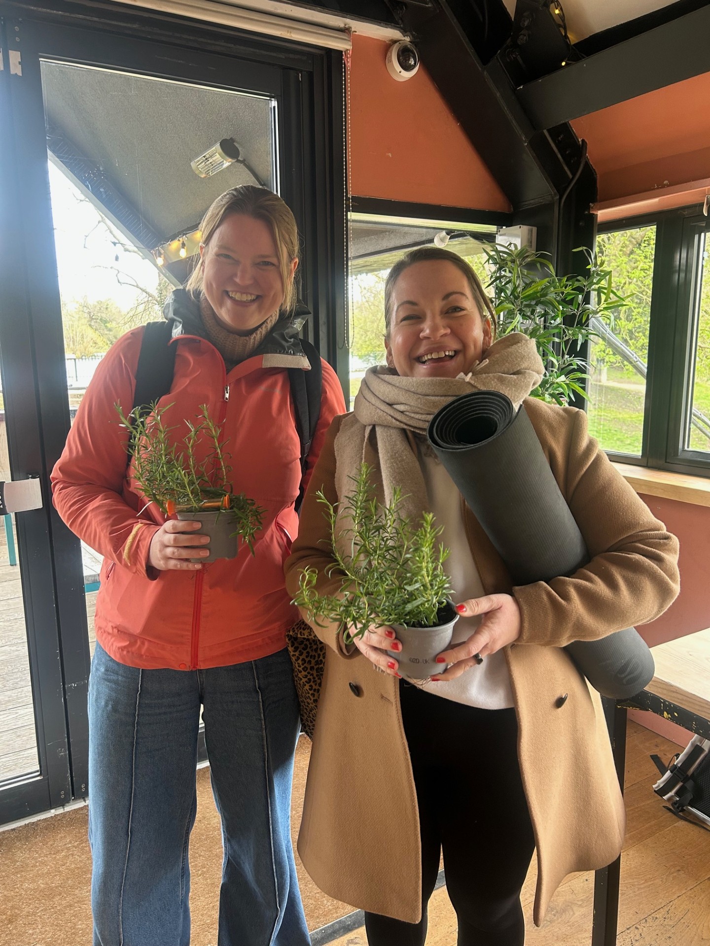 Retreat participants with rosemary plants