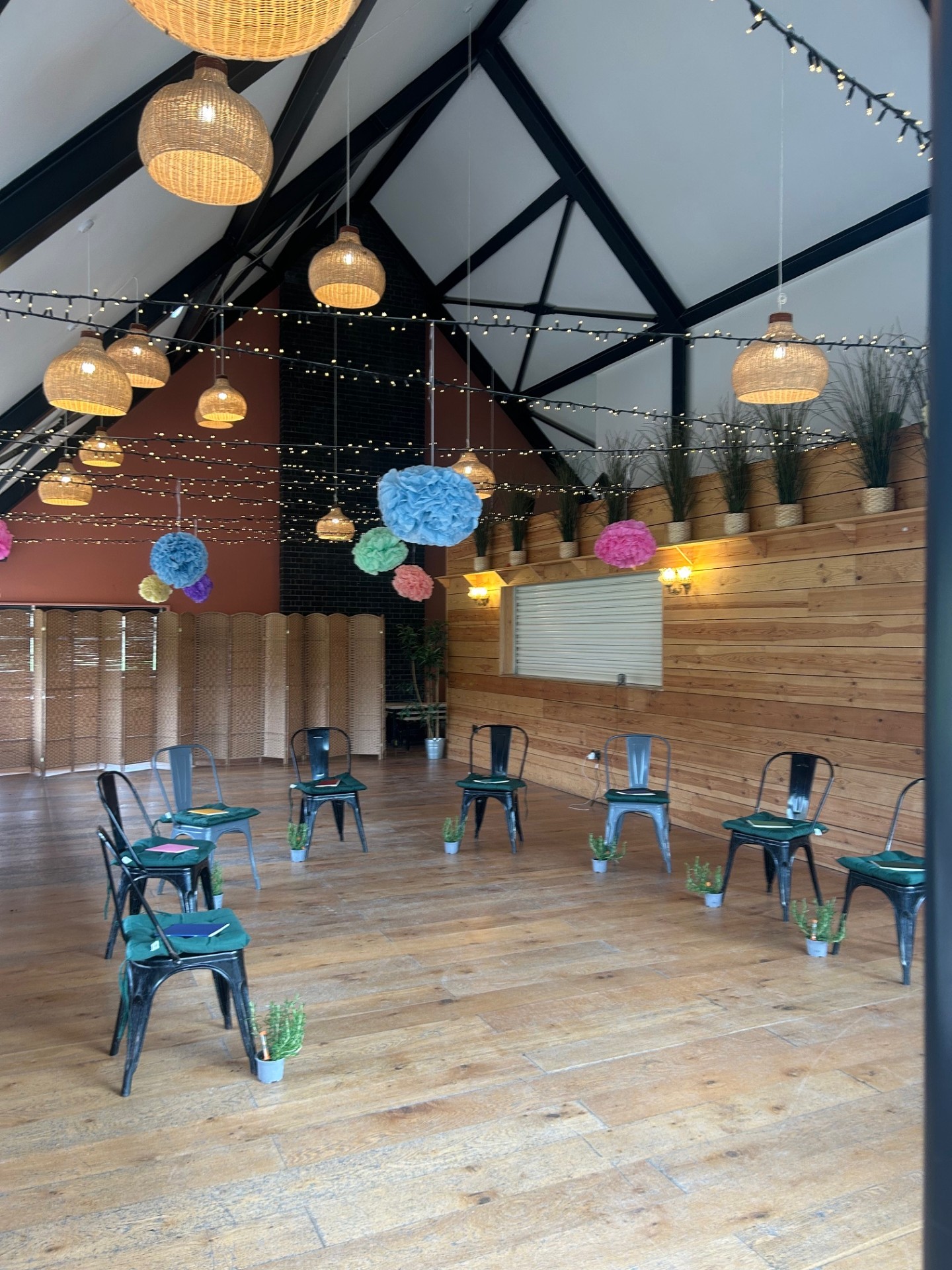 Retreat venue set up with chairs and decorations