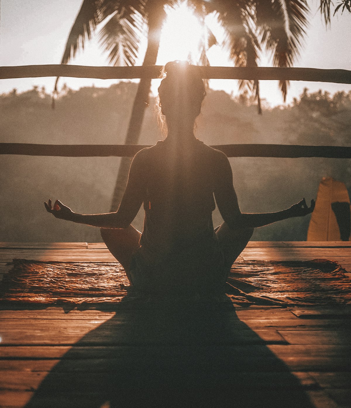 A person sitting in a calm outdoor space